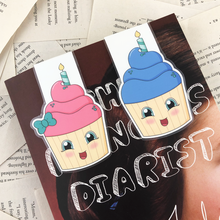 Load image into Gallery viewer, birthday cupcake laminated magnetic bookmarks in pink with a green bow, and blue