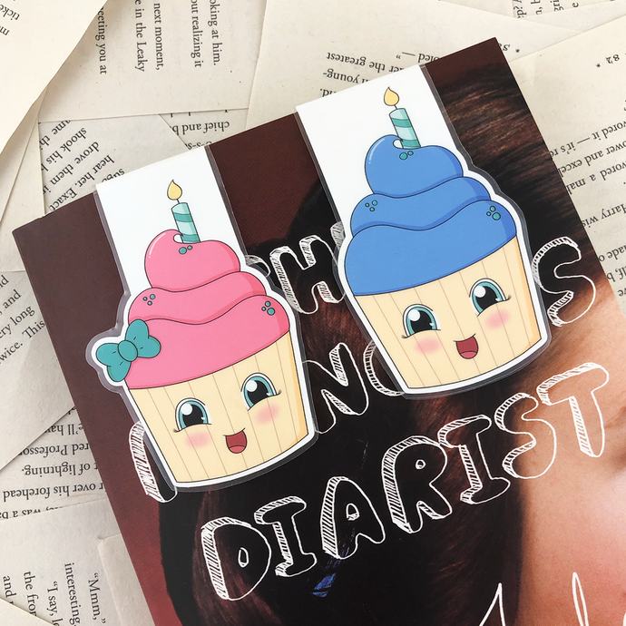birthday cupcake laminated magnetic bookmarks in pink with a green bow, and blue