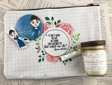 Load image into Gallery viewer, Jane Austen themed gift set featuring pocket mirror, laminated magnetic bookmark, limoncello lip balm, Pemberly gardens candle, and zip up pouch with the quote &quot;it isn&#39;t what we say or think that defines us, but what we do&quot;