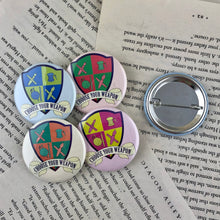 Load image into Gallery viewer, set of four creative crest pin back buttons reading &quot;choose your weapon&quot;