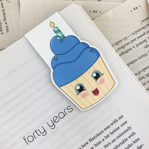 laminated magnetic bookmark featuring a blue cupcake with a birthday candle