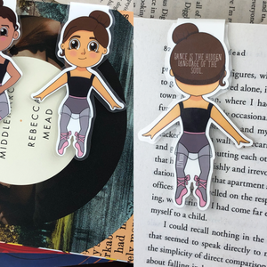 Kawaii cute laminated magnetic bookmark features brunette ballerina with words "dance is the hidden language of the soul" on back
