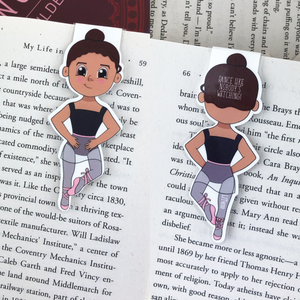 Kawaii cute laminated magnetic bookmark features brunette ballerina with words "dance like nobody's watching!" on back