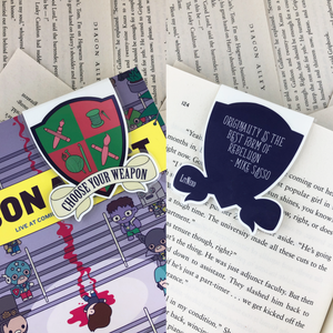 pink and green creative crest laminated magnetic bookmark reading "choose your weapon" on front and "originality is the best form of rebellion" on back