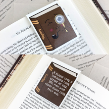 Load image into Gallery viewer, brown sleuth mystery laminated magnetic bookmark with words &quot;a reader lives a thousand lives before he dies, the man who never reads lives only one&quot;